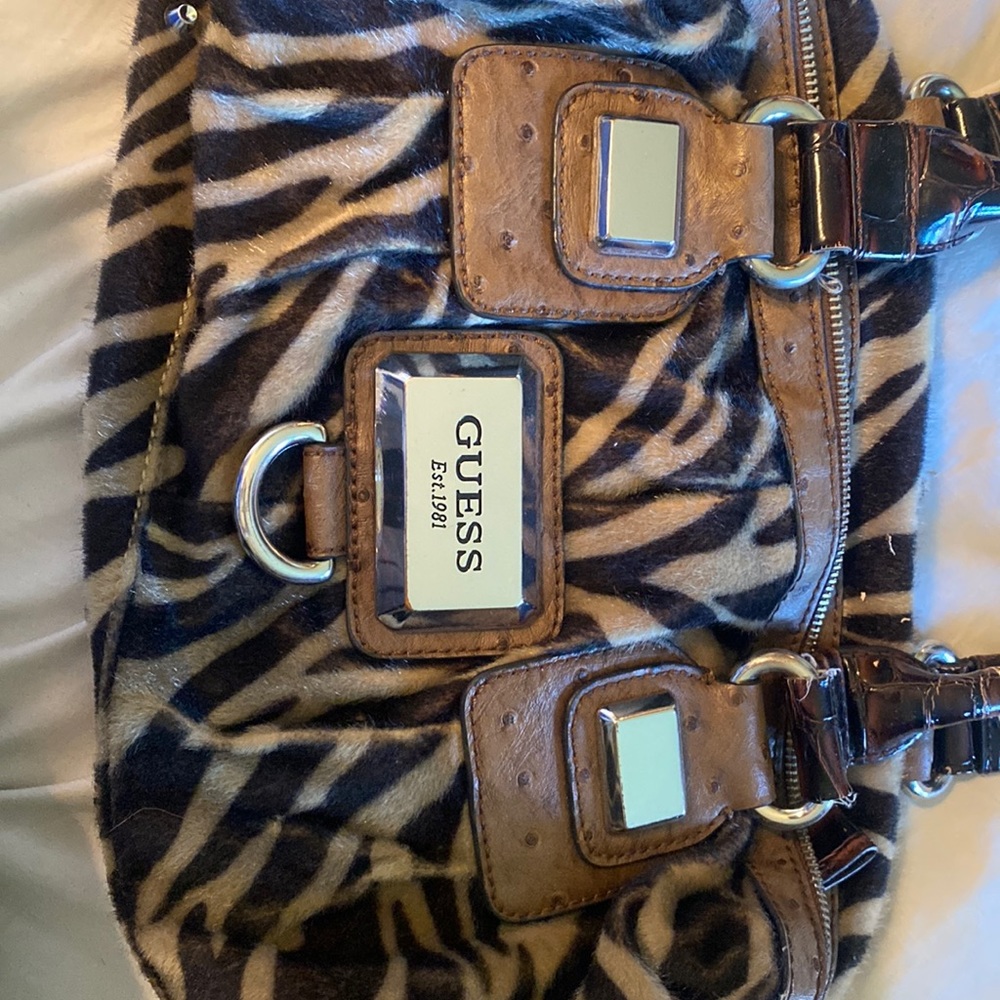 Guess purse with some wear on the handles